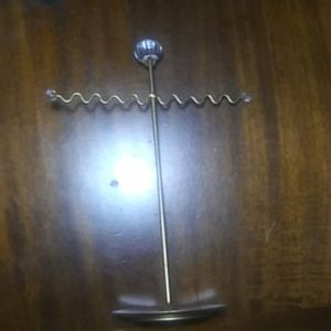 Gold amd crystal necklace and bracket stand